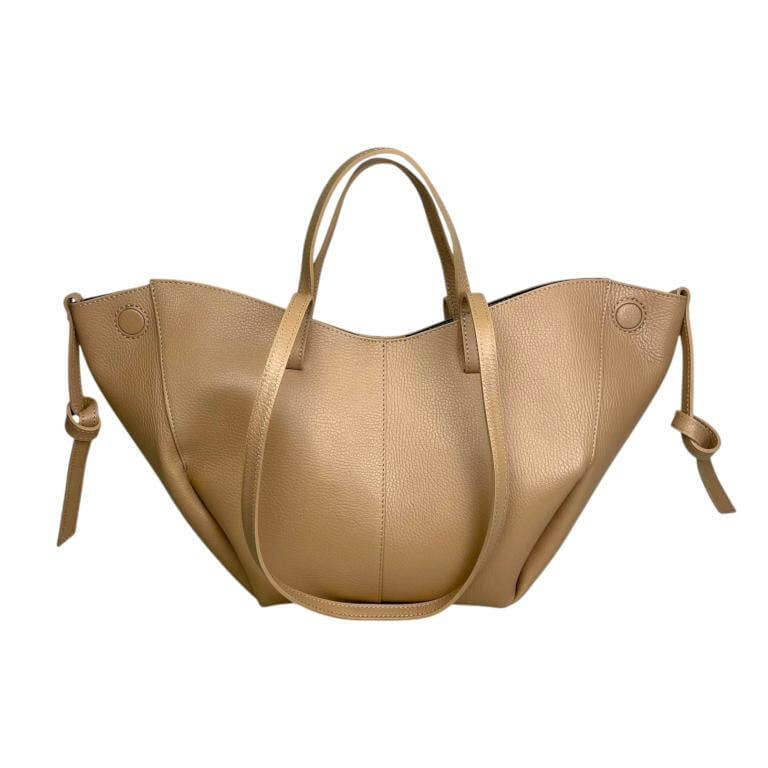 Elegant Italian leather handbag in beige with a spacious design and convertible size, perfect for modern women.
