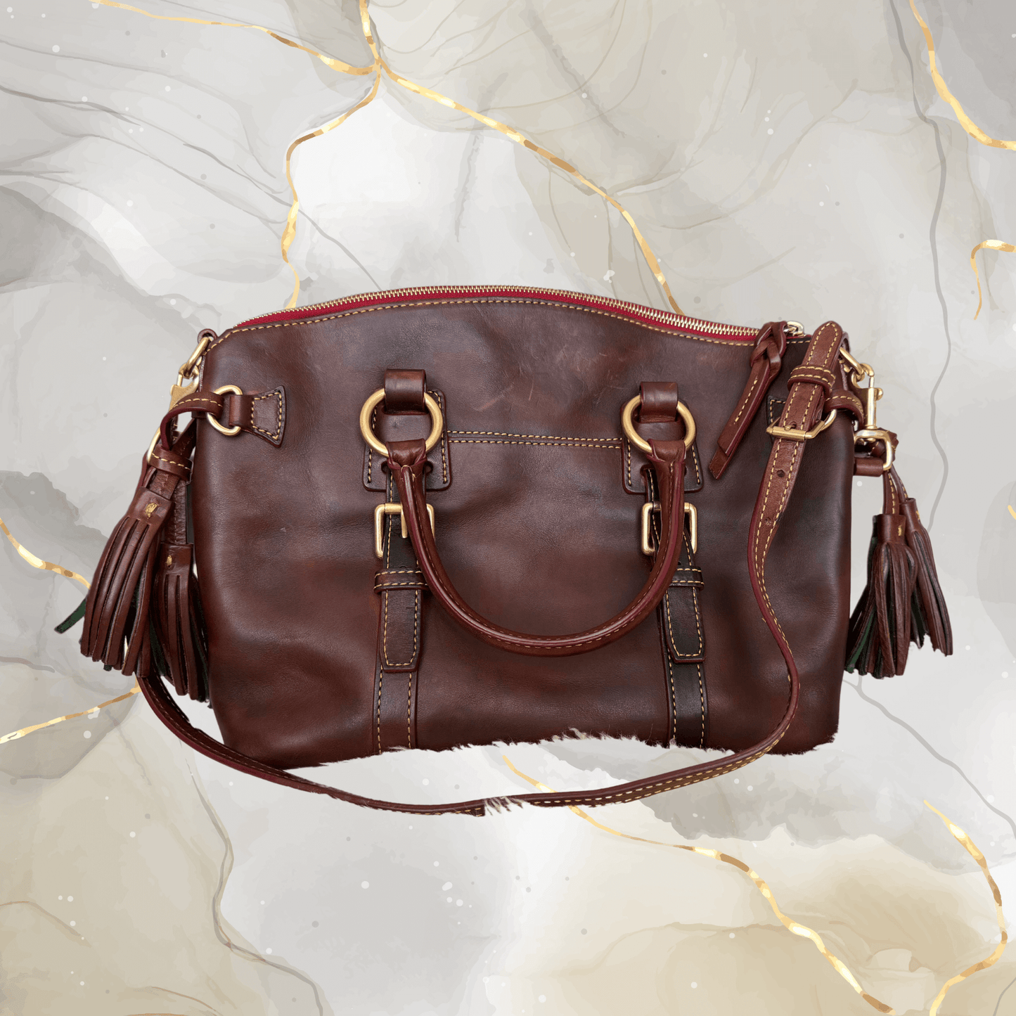 Pre-owned Dooney & Bourke Florentine satchel in chestnut brown with tassel details.